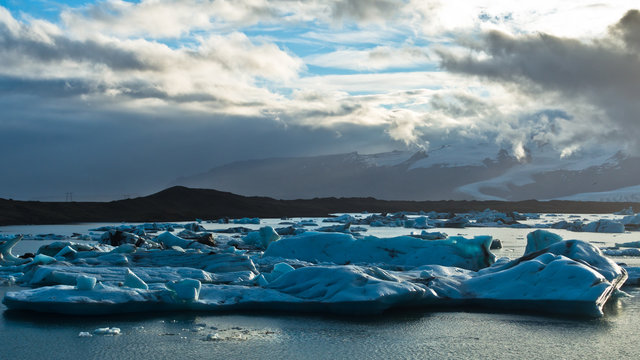 Icebergs are melting at Jokulsarlon glacier lagoon at sunset