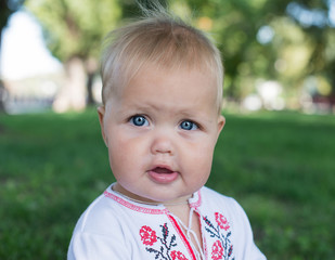 Funny kid with the big eyes close up