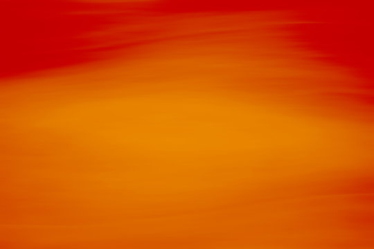 Red and orange flowing background.