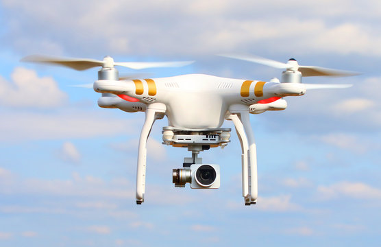 Drone quadrocopter with high resolution digital camera. New tool for aerial photo and video. 