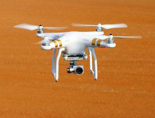 Drone quadrocopter with high resolution digital camera. New tool for aerial photo and video. 