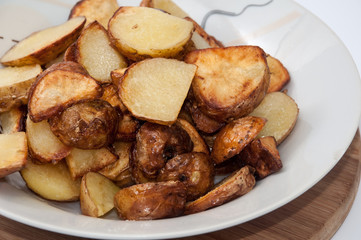 Freshly fryied young potatoes
