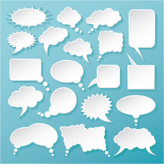 Shiny white paper bubbles for speech on an blue background.