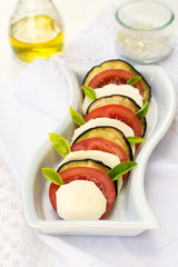Caprese salad with tomatoes, mozzarella and eggplant