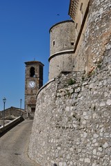 Fototapeta na wymiar Mura del Castello e Campanile della Chiesa di Santa Maria Assunta - Alviano - Terni - Umbria - Italia