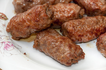 Balkan kebabs with minced meat served in the plate