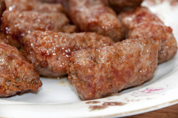 Balkan kebabs with minced meat served in the plate