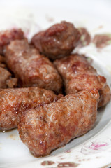 Balkan kebabs with minced meat served in the plate