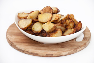 Young potatoes fried and served in the plate