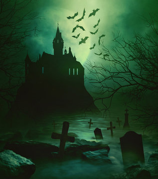 Spoody castle with graveyard down below