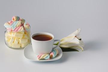 Morning tea cup with colored marshmallow
