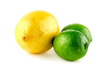 Lemon and two limes isolated in studio against white background