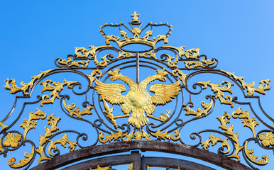 Openwork lattice of Catherine Palace  against blue sky. Tsarskoy