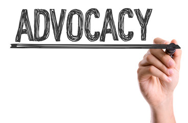 Hand with marker writing: Advocacy
