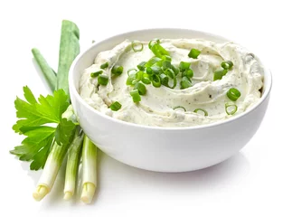 Foto op Canvas cream cheese with green onions and herbs © Mara Zemgaliete