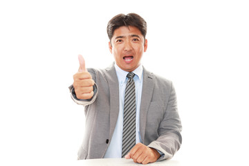ガッツポーズのビジネスマン