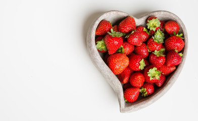 Strawberries in stone bowls