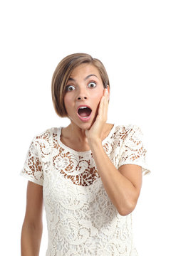 Shocked or surprised woman with a hand on face expressing wow