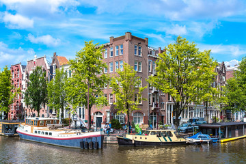 Fototapeta na wymiar Amsterdam canals and boats, Holland, Netherlands.