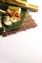 malay lemang served with rendang ayam