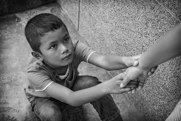 A young Asian boy who is scared and alone, he is at high risk of being physically, mentally and sexually abused and trafficked. His mental health is of great concern.