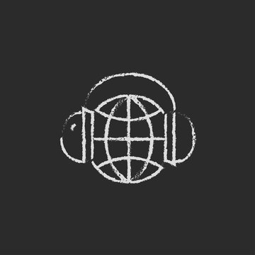 Globe in a headphones icon drawn chalk.