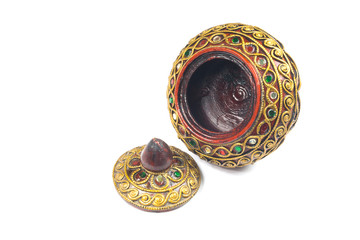 Thai casket wood craft on the wooden background
