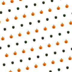 Green and Orange Pumpkin against white background