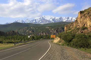 Chuysky Trakt and snow caps of North Chuya ridge.
