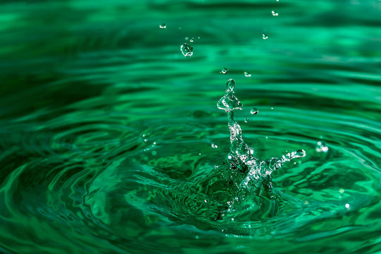 water splash on green background