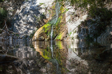 Fototapeta na wymiar Peaceful waterfall in the forest