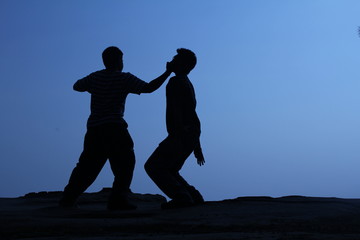 Fototapeta na wymiar people fight(silhouette)