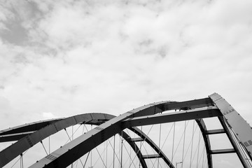 The steel construction of the red bridge. Black and white
