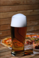 pizza and a glass of beer