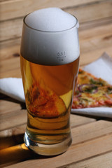 pizza and a glass of beer