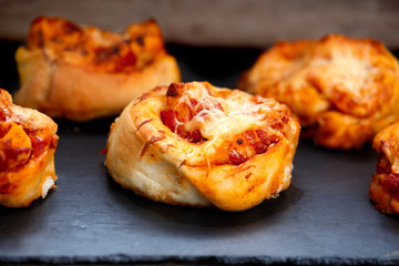 Closeup Homemade Tomato, garlic and cheese swirls.  Ready to eat.