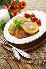 Homemade pancake with sugar powder