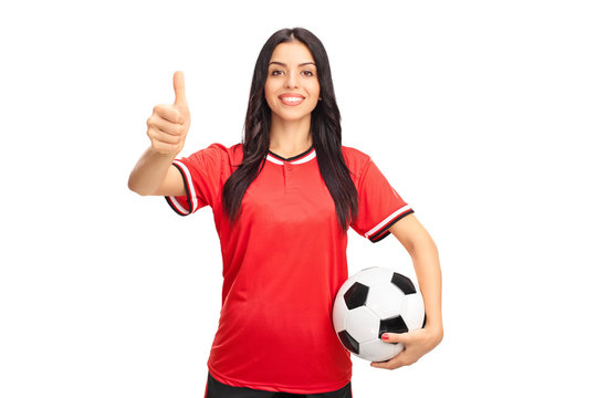 Young female soccer player giving a thumb up