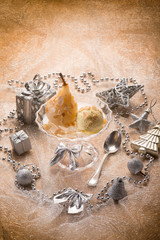 ice cream and pear over christmas table