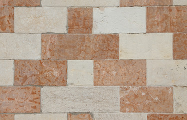 wall of red and white marble of an ancient Palace in Europe