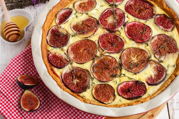 Quiche with figs, thyme and honey.selective focus