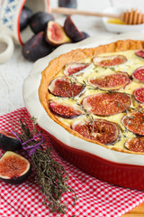 Quiche with figs, thyme and honey.selective focus