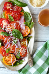 fresh tomatoes salad on plate