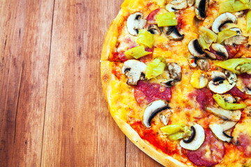pizza on wood background