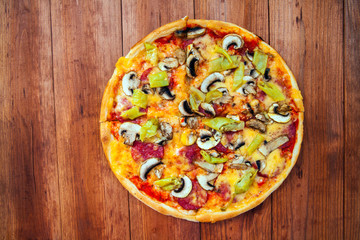 pizza on wood background