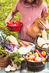 Lovely girl  plays with vegetables