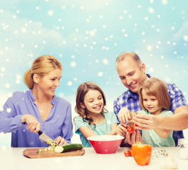 happy family with two kids making dinner at home