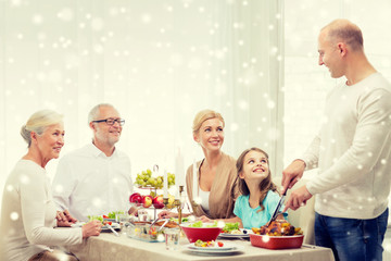 smiling family having holiday dinner at home