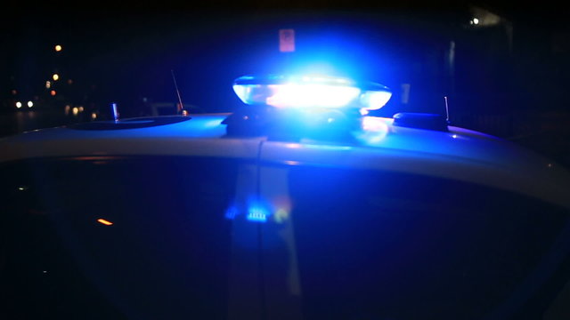 Actual LAPD Police activity in neighborhood involving police cars, sirens, choppers at night in Los Angeles, California