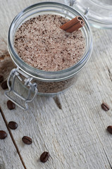 Homemade scrub made of sugar, ground coffee and cinnamon powder